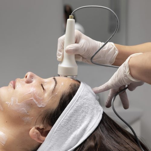 young-woman-having-facial-treatment